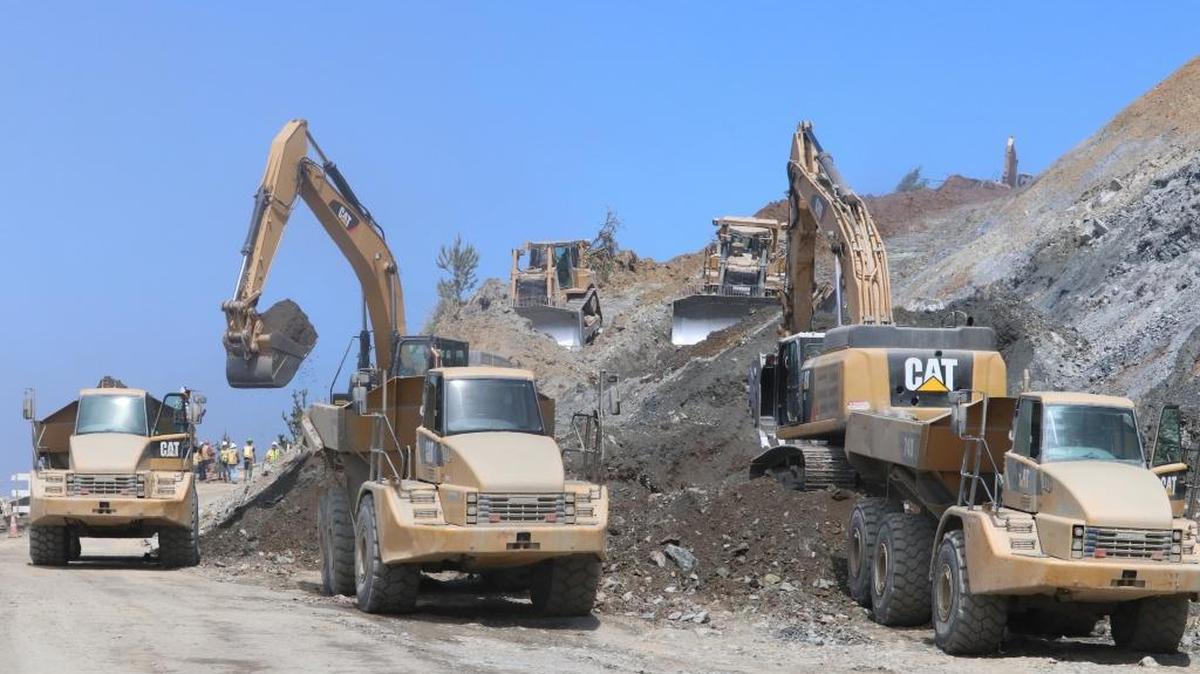 Caltrans crews work on Paul’s Slide on Thursday on Highway 1.