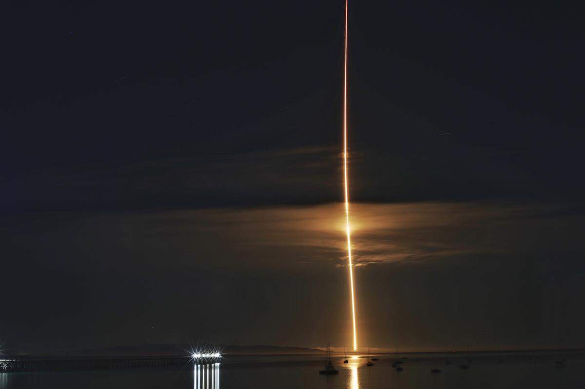 The DART mission launches from Vandenberg Space Force Base on Nov. 24, 2021, as seen from Port San Luis in this 4-minute time exposure. The Double Asteroid Redirection Test is the world’s first planetary defense test mission, testing whether a spacecraft impact with the Dimorphos asteroid can slightly alter its orbit.