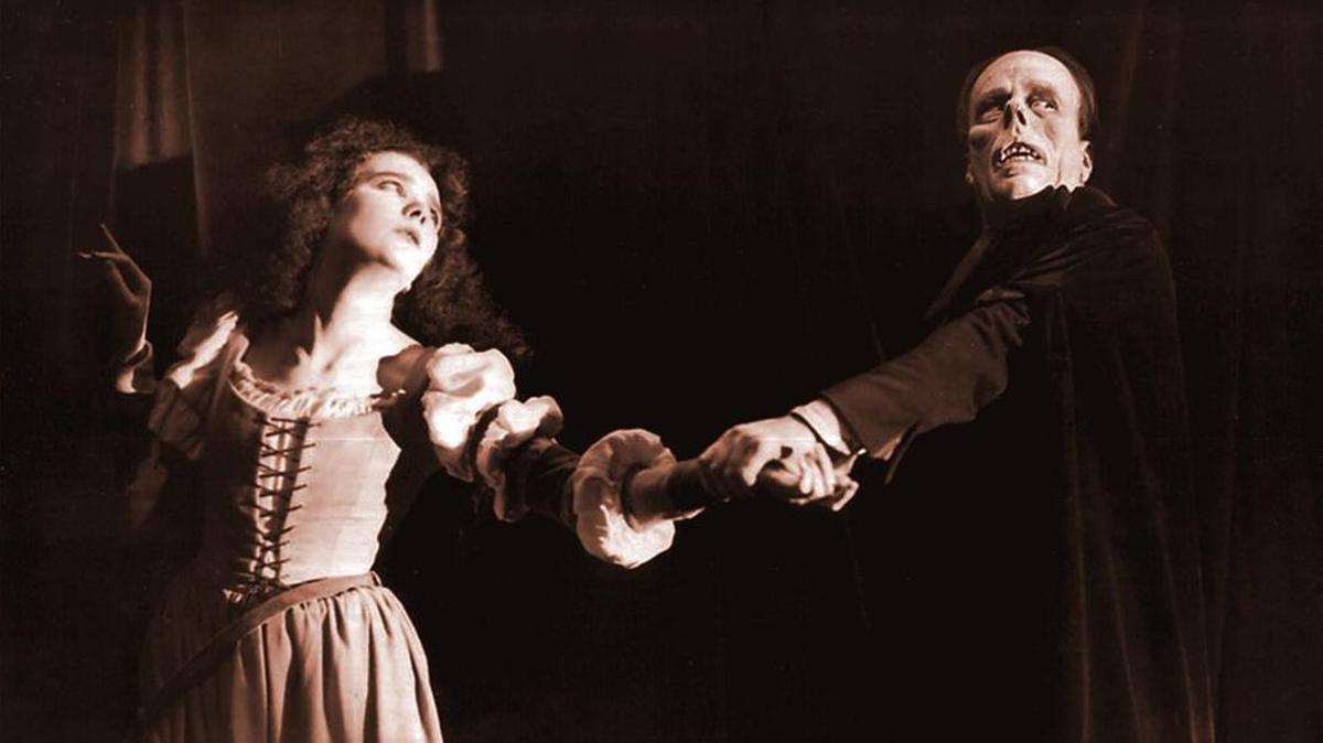 Mary Philbin and Lon Chaney appear in the 1925 silent movie “The Phantom of the Opera.”