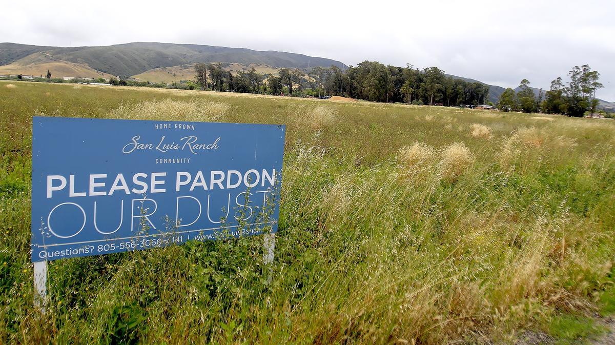 Construction on the San Luis Ranch project, a 580-home project, is underway in San Luis Obispo. The project will be a mix of multi-family and single-family homes. This sign is on the north side of property along Dalidio Drive, looking toward the area where homes and open space will be.