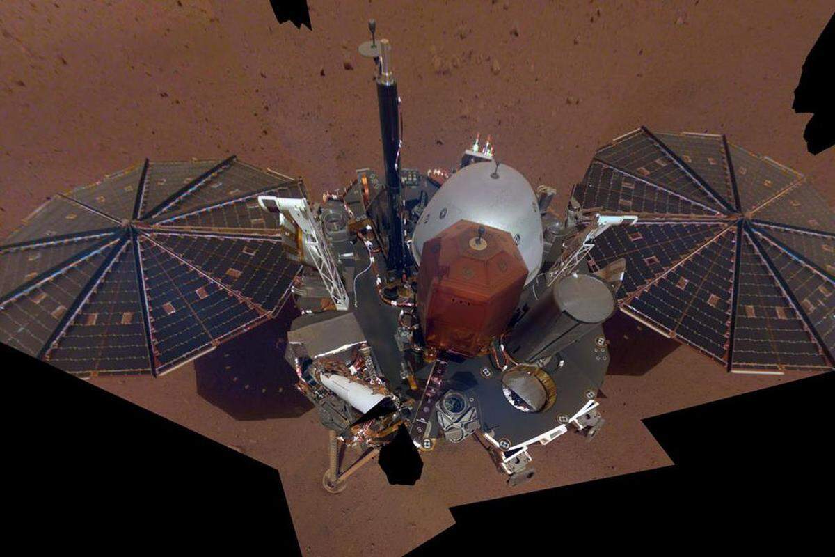This is NASA InSight’s first full selfie on Mars. It displays the lander’s solar panels, made in Goleta, and deck. On top of the deck are its science instruments, weather sensor booms and UHF antenna.