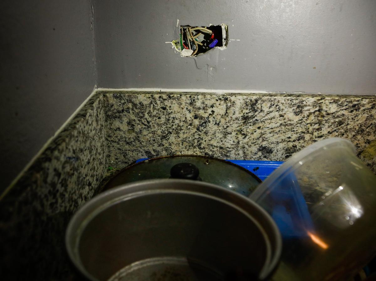Exposed wire is seen in a wall inside of a college student’s apartment at The SLO Student Living complex near Cal Poly in San Luis Obispo.