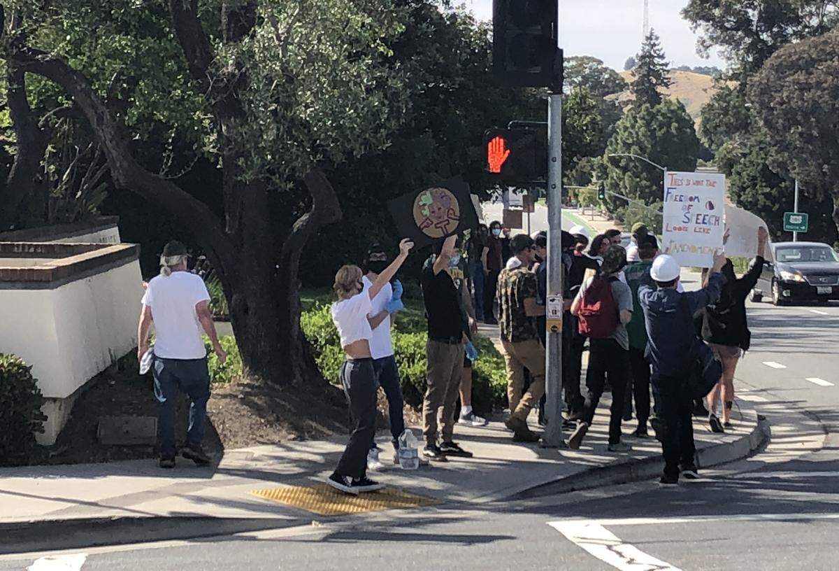 Protesters gather outside the SLO Police Department on Tuesday.
