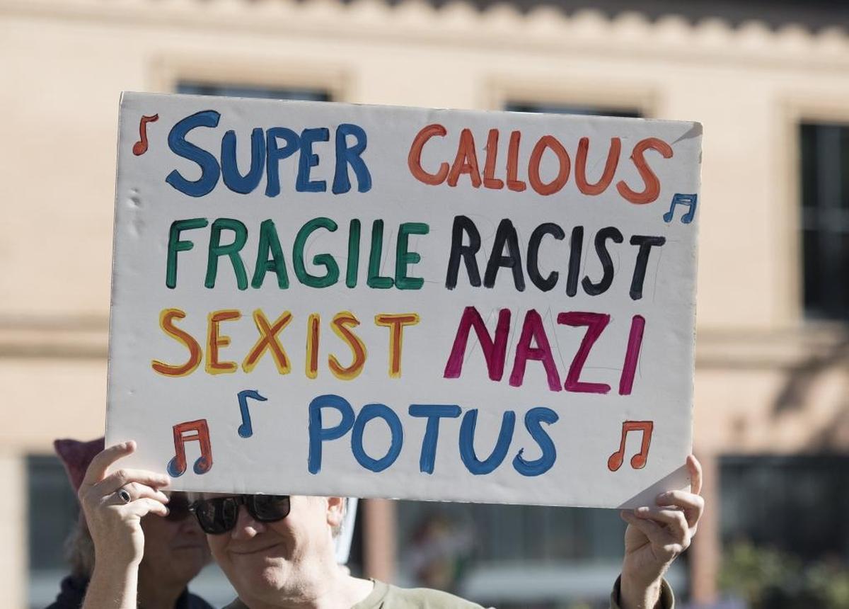 Signs from Saturday’s “Hear Our Vote: Voices of Resistance Rally.”