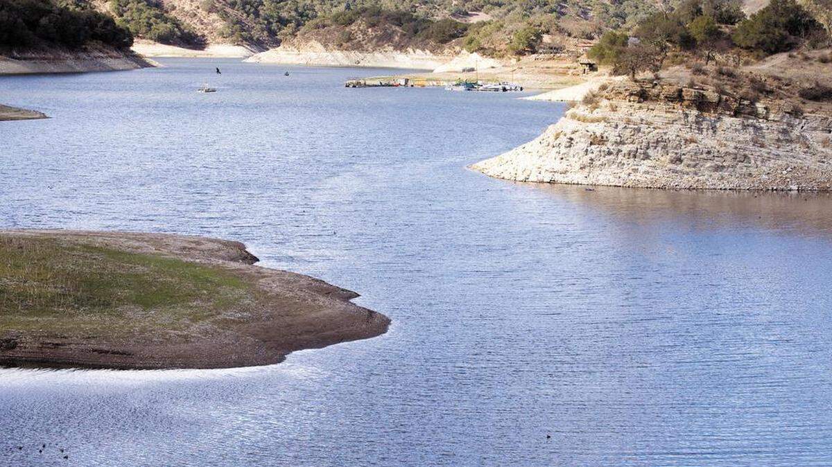 Lopez Lake is shown Jan. 22, 2014. The white exposed rock marks the water line at capacity; mud flats are becoming exposed.