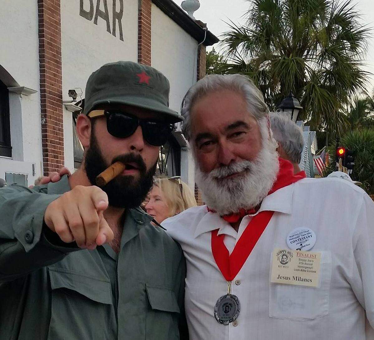 Jorge Milanes, right, poses next to a man dressed up as Fidel Castro. Milanes was named a finalist in the 2017 Hemingway Look-Alike contest in Key West, Florida.