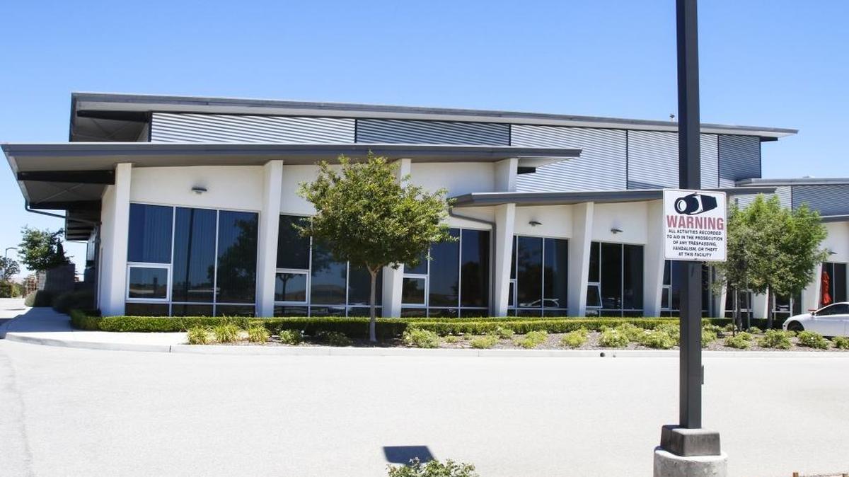 Justin Vineyards and Winery’s storage and bottling facility on Wisteria Lane in Paso Robles. The company is in the process of adding a third building to store wine barrels.