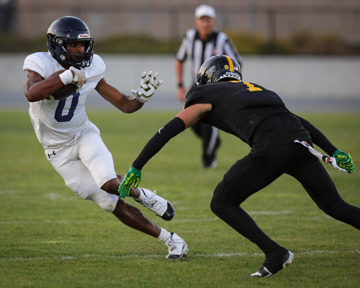 Caleb Clark prepares to straight arm Britton Rethmeier. Arroyo Grande beat San Luis Obispo 23-0 Sept. 6, 2024. Cark is The Tribune’s SLO County player of the year.