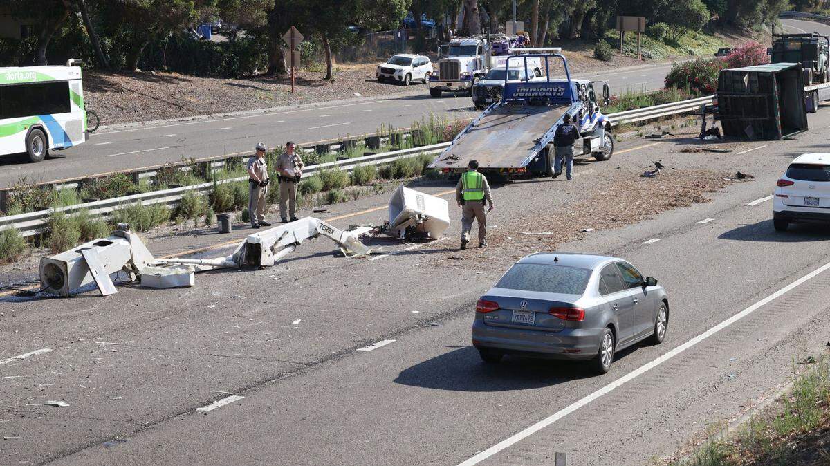 A truck slammed into the railroad bridge on southbound Highway 101 in San Luis Obispo near Santa Rosa Street, littering the southbound lane with debris on Tuesday, Aug. 22, 2023.