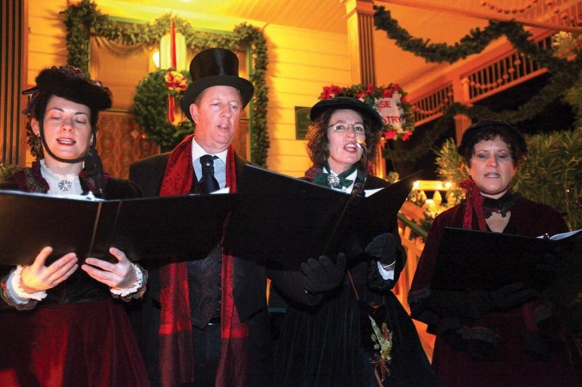 Carolers perform during the Vine Street Victorian Christmas Showcase in Paso Robles in 2012.
