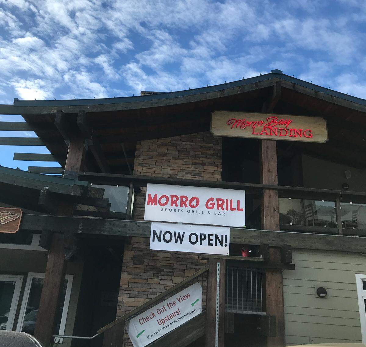 The new Morro Grill, on the second story of a distinctively roofed building, is on the town’s Embarcadero. The restaurant’s dining room and outdoor deck overlook Morro Rock and the bay.