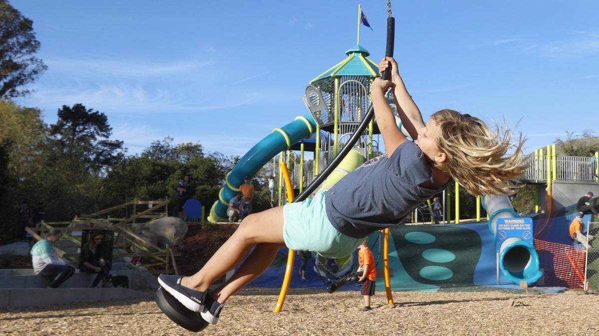 Madison Wilimek, then 8, takes a turn on the zipline at Sinsheimer Park in San Luis Obispo in 2017. The San Luis Obisp City Council approved park plans for a new facility at 533 Broad St. on Tuesday, March 2, 2021.
