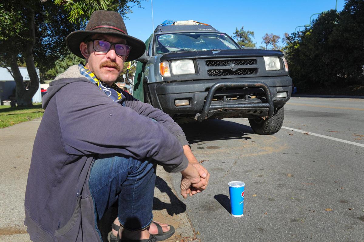 Benjamin Kincaid, 34, prepared to move from Palisades Avenue in Los Osos — where he’d been living in his vehicle for more than a year — to the safe parking site on Kansas Avenue. Kincaid, who works at a restaurant in Morro Bay, worried he’d have to quit his job because he could no longer use his bike for transportation.