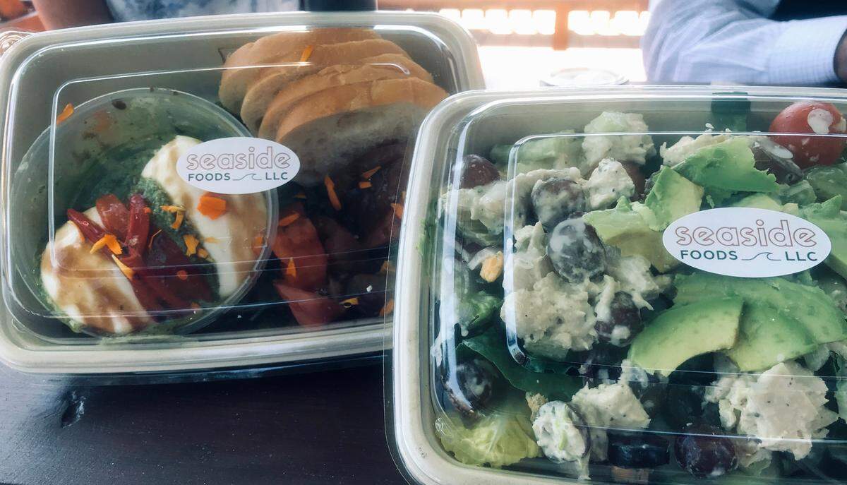 Two lunch offerings at Seaside Foods in the renovated, reopened Sebastian’s General Store in Old San Simeon Village on the store’s reopening weekend in mid-June 2023 were the Burrata Caprese Salad and a salad version of the deli’s San Simeon Chicken sandwich.