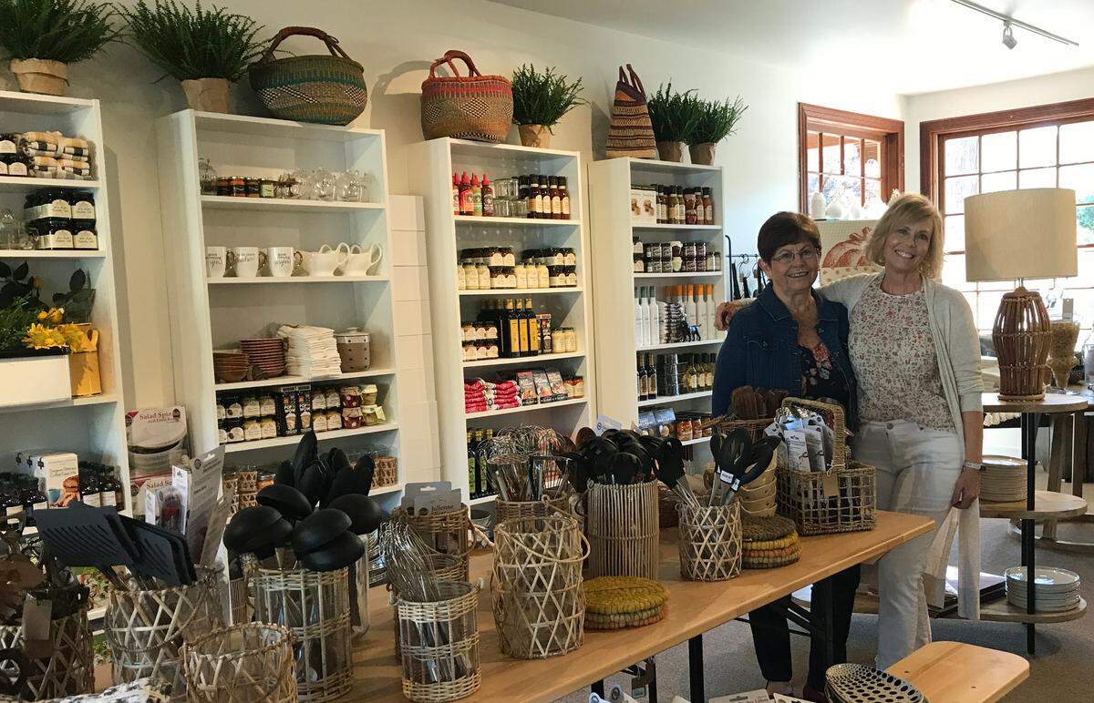 Jacqueline Norgan, at right, and her mom Sandi Seller pause for a moment before the grand opening of Terracotta Home and Garden in Cambria on Sept. 2, 2022.