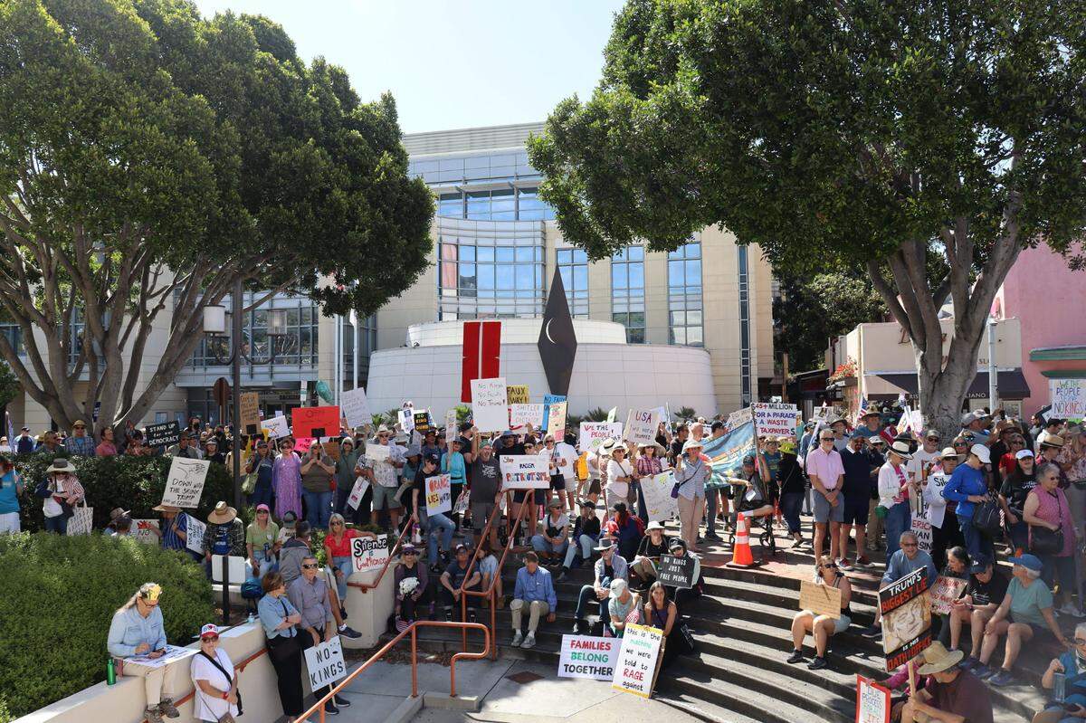 Protestors gathered in front of the courthouse in San Luis Obispo, for No Kings Day to protest executive overreach by the Trump administration on the president’s birthday.