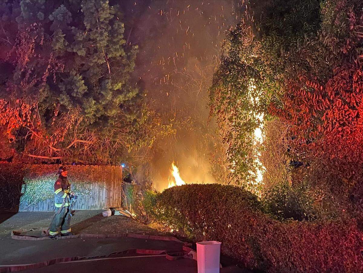 Firefighters extinguished a fire on Chorro Street near the shoulder of Highway 101 on Sept. 4, 2024.