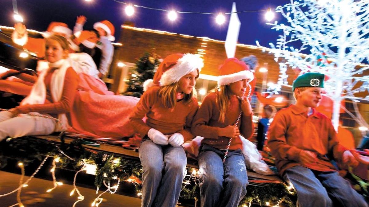 Members of the Nipomo Foothill 4-H make their way along the parade route during the Arroyo Grasnde Village Christmas parade.