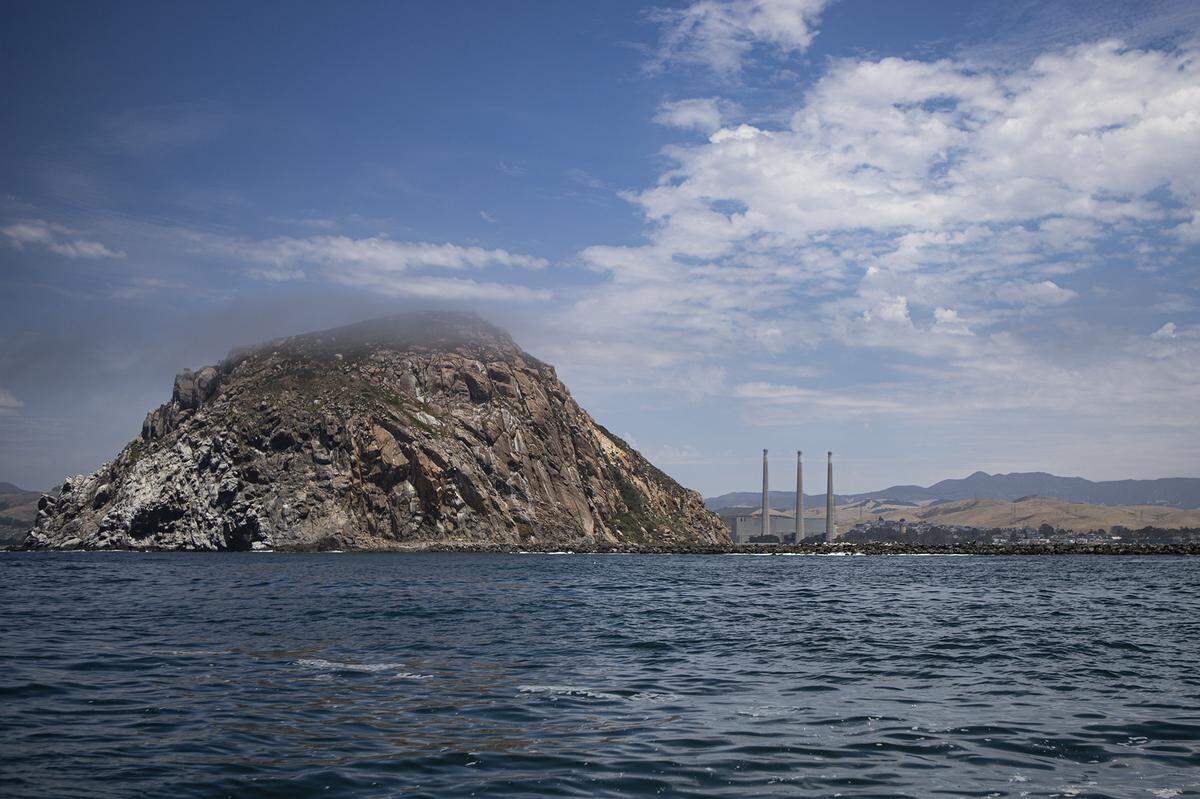 Afternoon fog slowly covers Morro Rock, a major landmark in Morro Bay. The city is a nice spot for a quick day-trip to escape the Valley heat.