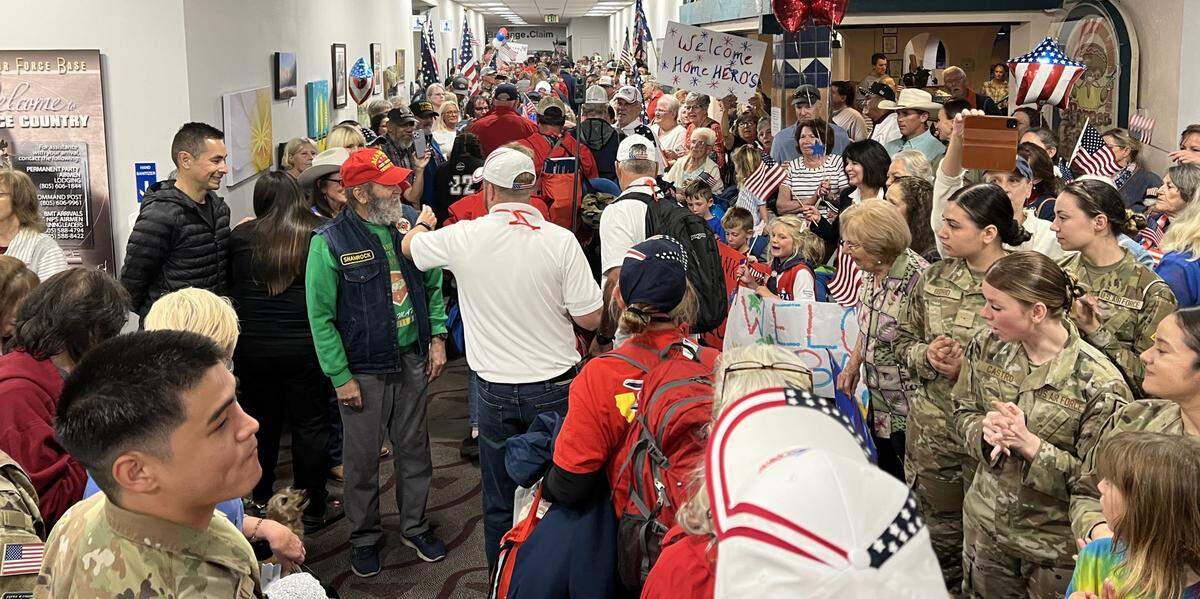 Hundreds of supporters, families and friends turned out at the Santa Maria Airport on Wednesday evening, April 26, 2023, to welcome veterans returning from an Honor Flight trip to Washington, D.C.