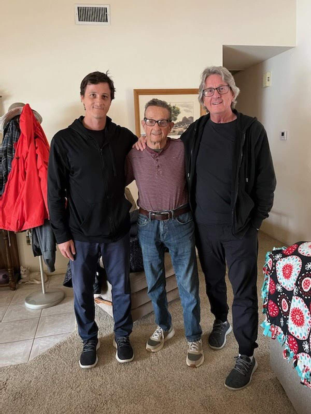 Davis Vanderlinde, Glenn Vanderlinde and David Vanderline pose for a photo.