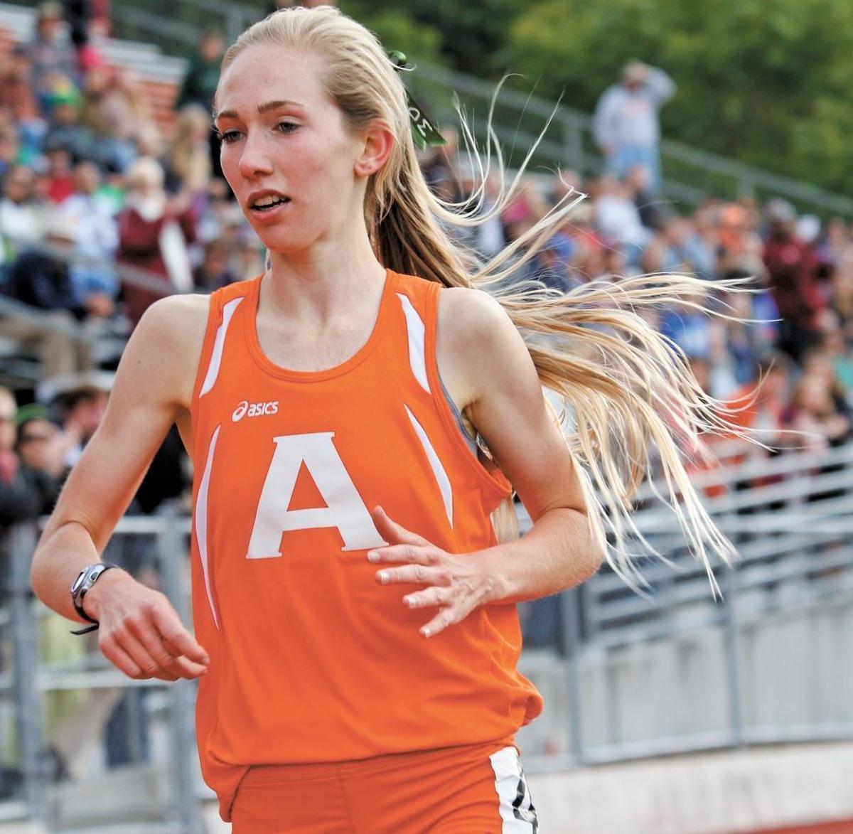 Brittni Frace of Atascadero, here winning the 1,600 meters at the Pac 8 track meet at Atascadero High School in May 2015, was killed in a crash on Highway 198 near Lemoore on Tuesday. She was driving back to Chico State, where she is on the track and cross country teams. Her sister, Brynn Frace, was also badly injured in the crash.