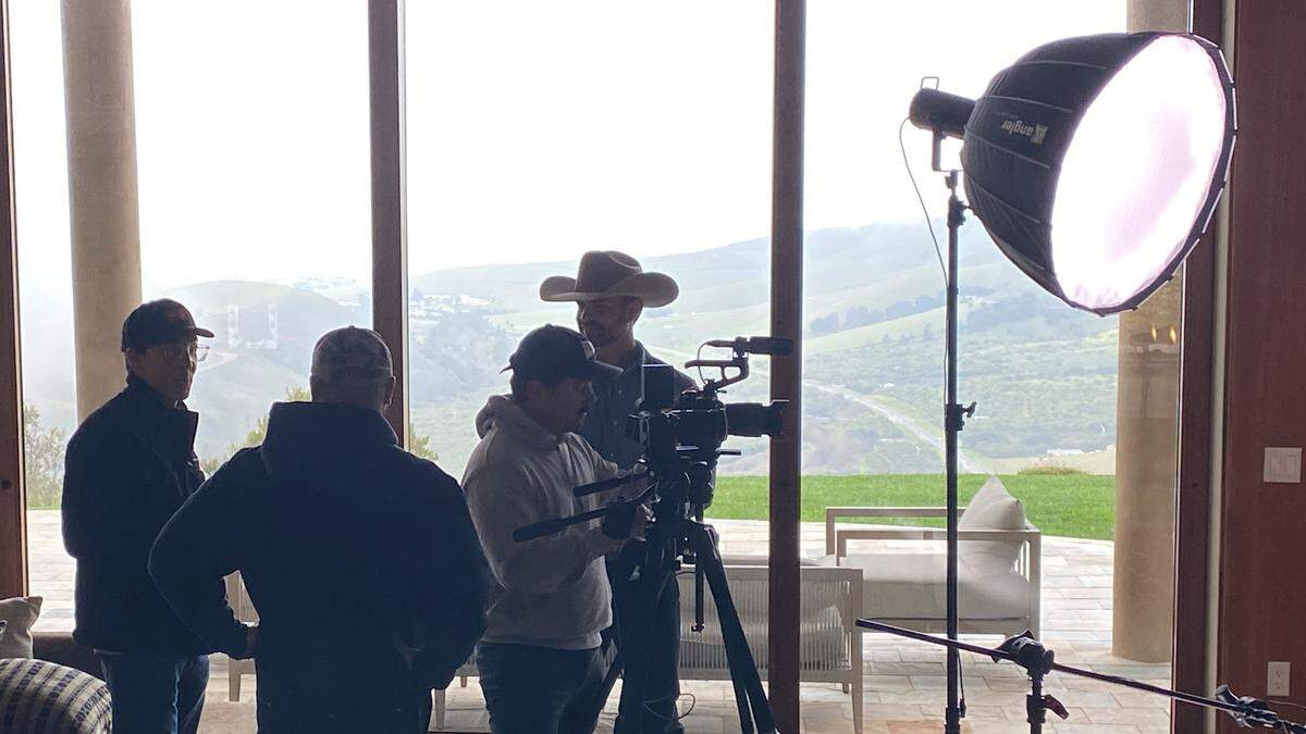Matt Warren, 30, of Morro Bay is one of the farmers cast in the Fox series, season 3 of Farmer Wants a Wife on March 5, 2025. He stands with a film crew.