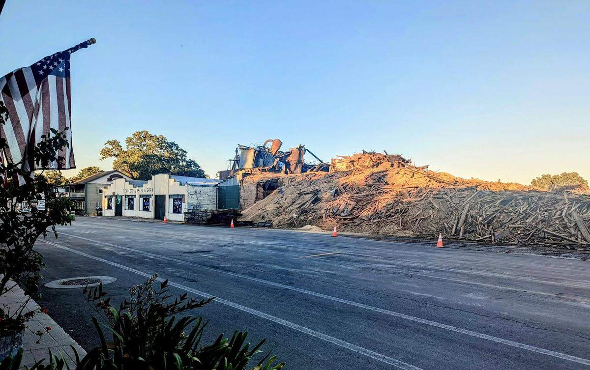 All that remains of Templeton Feed & Grain’s iconic towers is a massive pile of rubble after the structure’s demolition was completed on Wednesday, July 8, 2025.