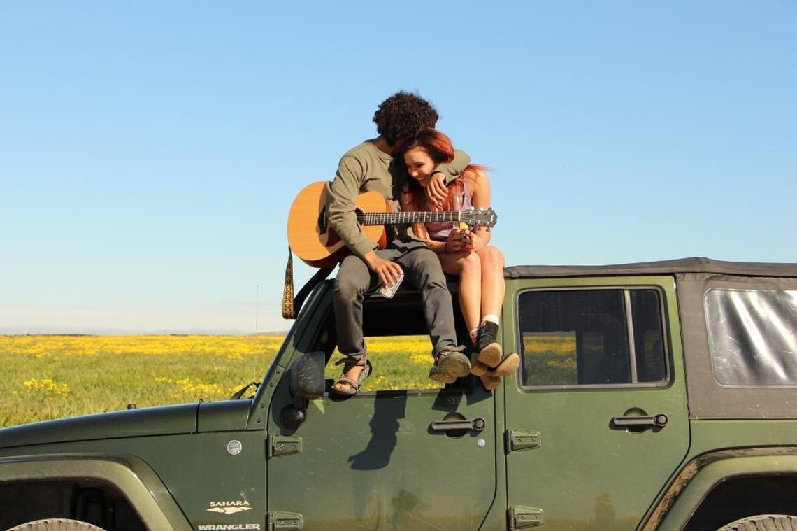 Kennedy Love hugs his friend Tori Fields on top of a car in Carrizo Plain during the superbloom this past spring.