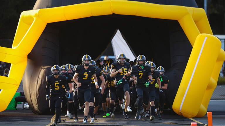 San Luis Obispo beats Mount Whitney 34-23. See the photos