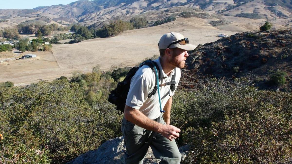 San Luis Obispo Ranger Services Supervisor Doug Carscaden hikes to a new loop trail under construction in Reservoir Canyon in October.