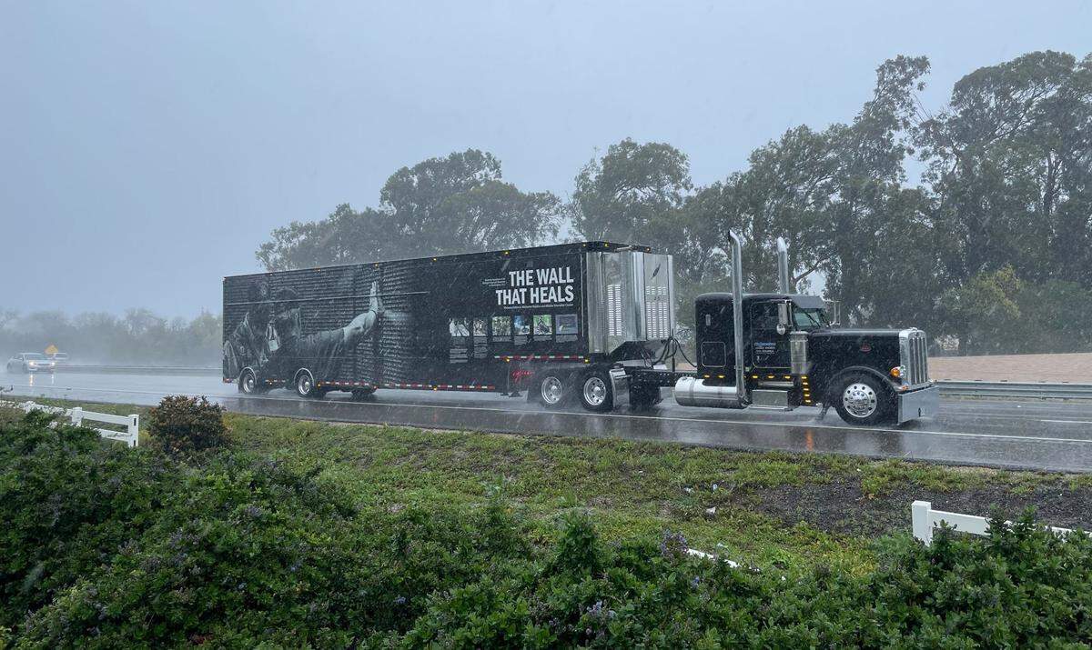 The semi truck carrying the traveling Vietnam War memorial, The Wall that Heals, arrives in San Luis Obispo on March 14, 2023.