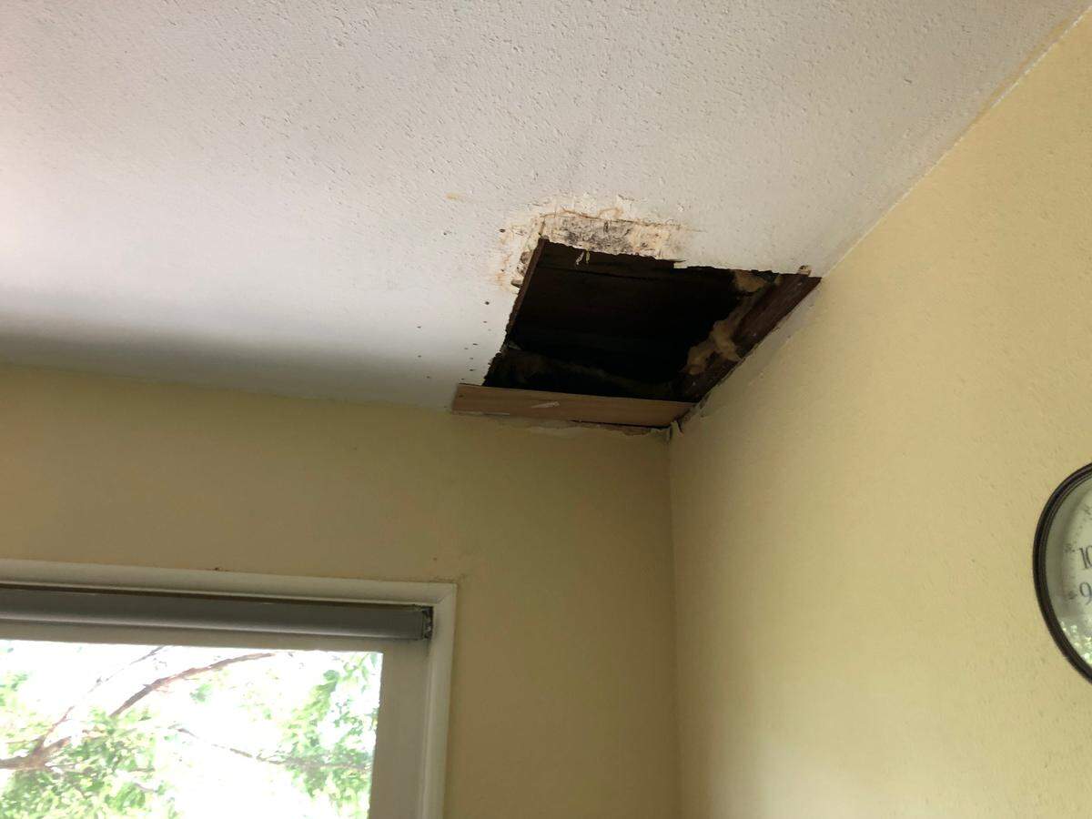 A large hole caused by a leak in a Grand View Apartments resident’s bedroom ceiling. The resident claims she and her husband alerted property management, but they have yet to fix it.