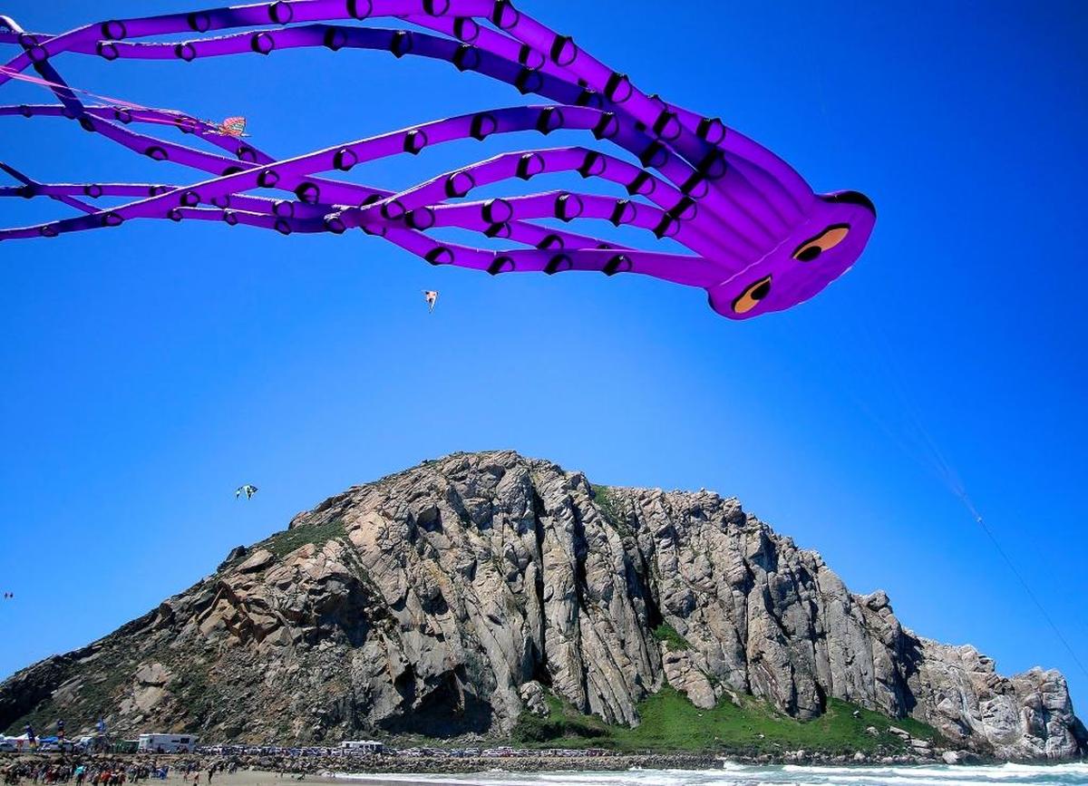 Morro Bay is proposing a new vacation rental tax that would help attract tourists through marketing. Here, a kite is flown with the backdrop of Morro Rock.