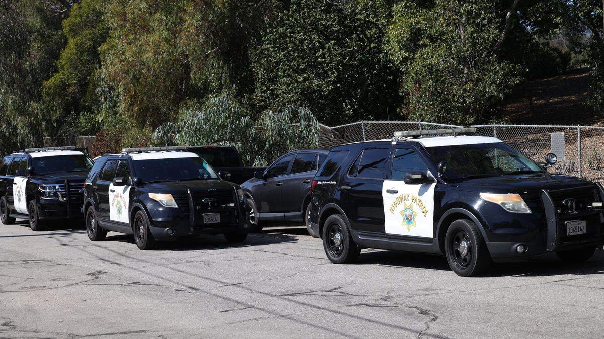 California Highway Patrol officers respond to the discovery of a body on the northbound shoulder of Highway 101 in San Luis Obispo, California on Oct. 17, 2022.