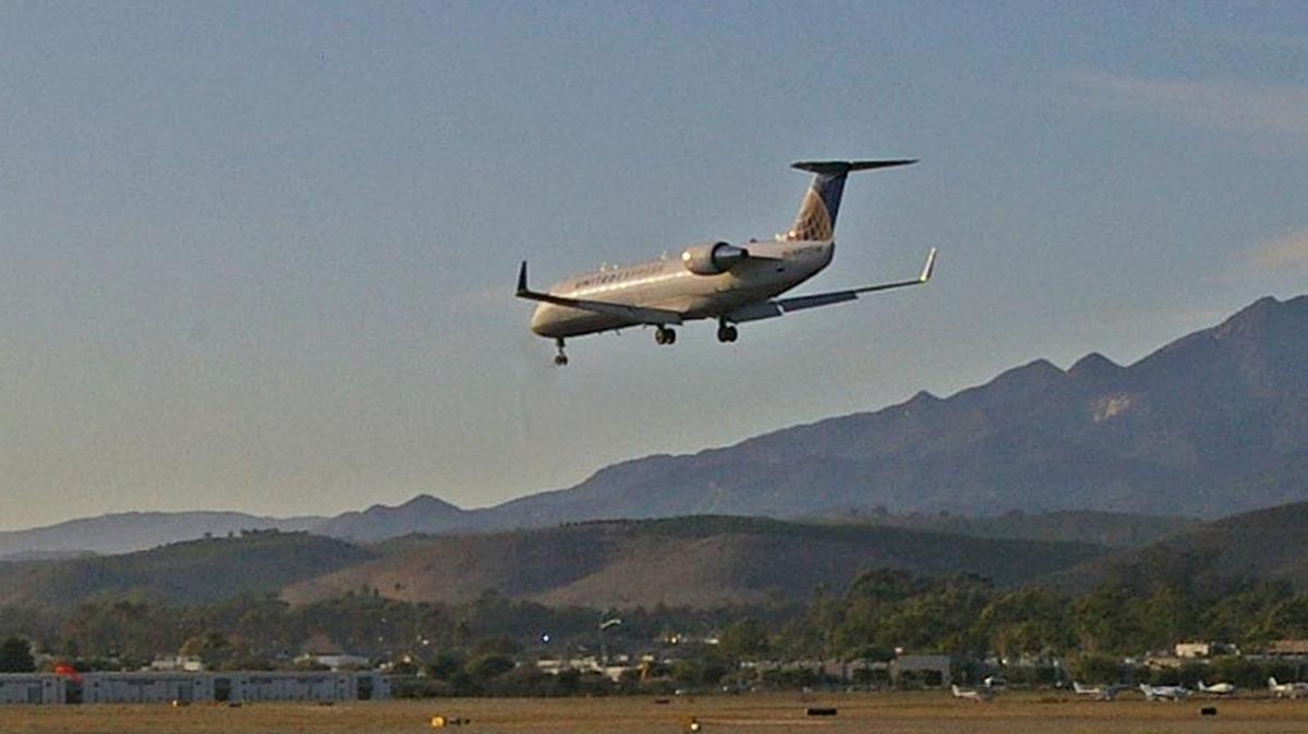 A United Airlines CRJ-200 regional jet, operated by Skywest Airlines, lands at the Santa Barbara Airport after flying from LAX.