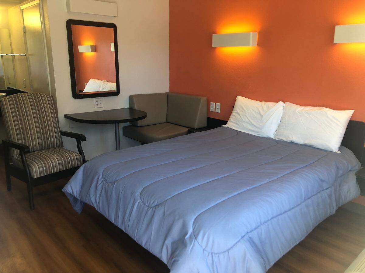 Hotel rooms at the former Motel 6 in Paso Robles have been converted to subsidized studio apartments rented by the Housing Authority of San Luis Obispo (HASLO). Most of the original motel furniture remains, although HASLO added some additional touches, including new comforters for the beds.