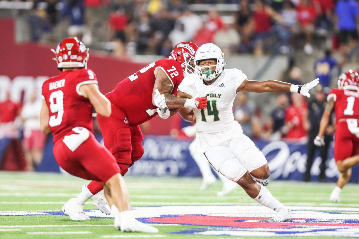 Elijah Ponder rushes the quarterback during Cal Poly’s 35-7 loss to Fresno State on Thursday, Sept. 1, 2022.