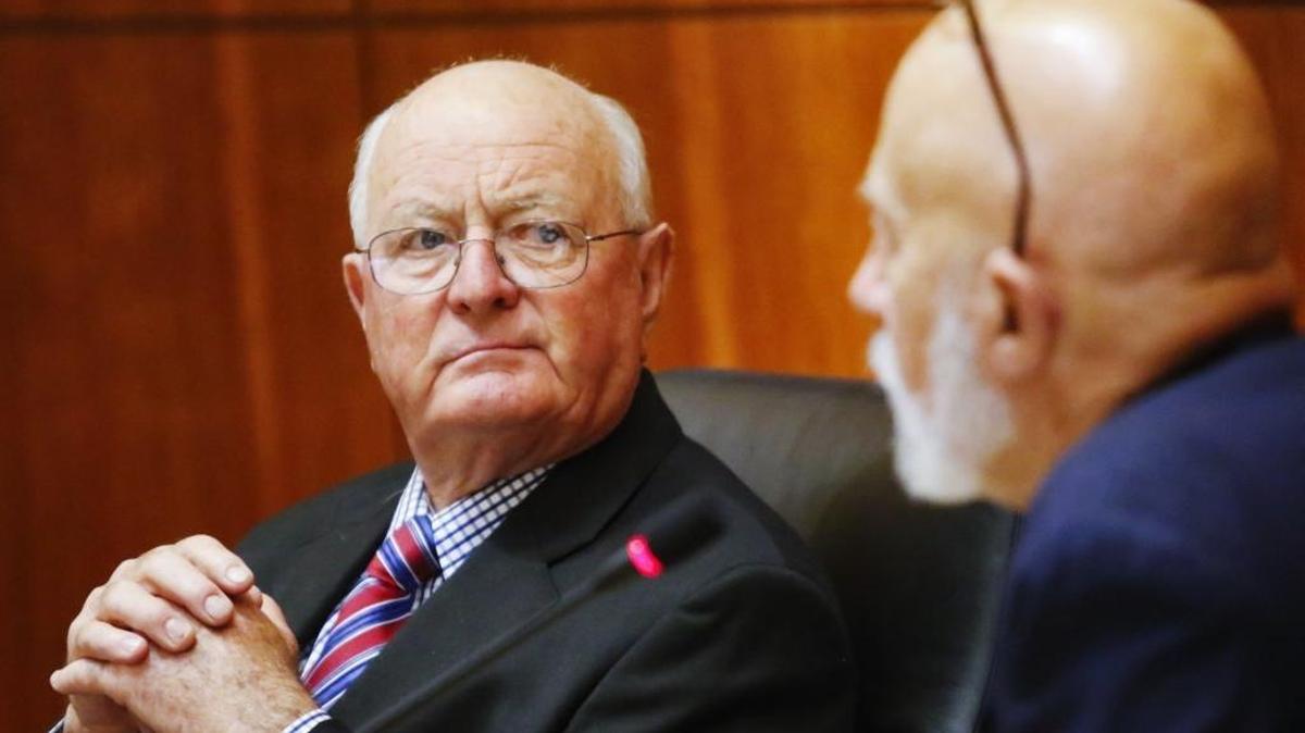 San Luis Obispo County Planning Commission Chairman Don Campbell listens as Commissioner Jim Irving speaks. The group considered the application Monday by Phillips 66 for oil delivery by train. Another hearing is scheduled for Sept. 22.