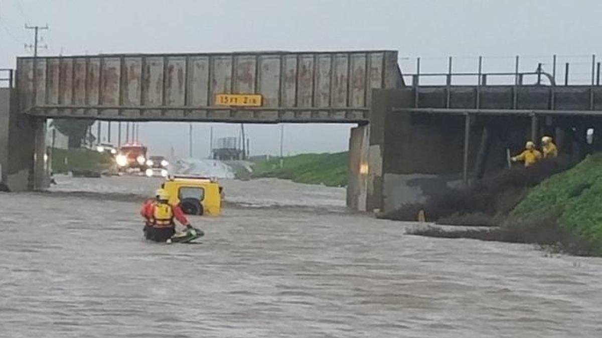 A San Luis Obispo County Urban Search and Rescue team assists a driver whose van was stuck in three feet of water on Highway 1 between Nipomo and Guadalupe on Friday, Feb. 17, 2017.
