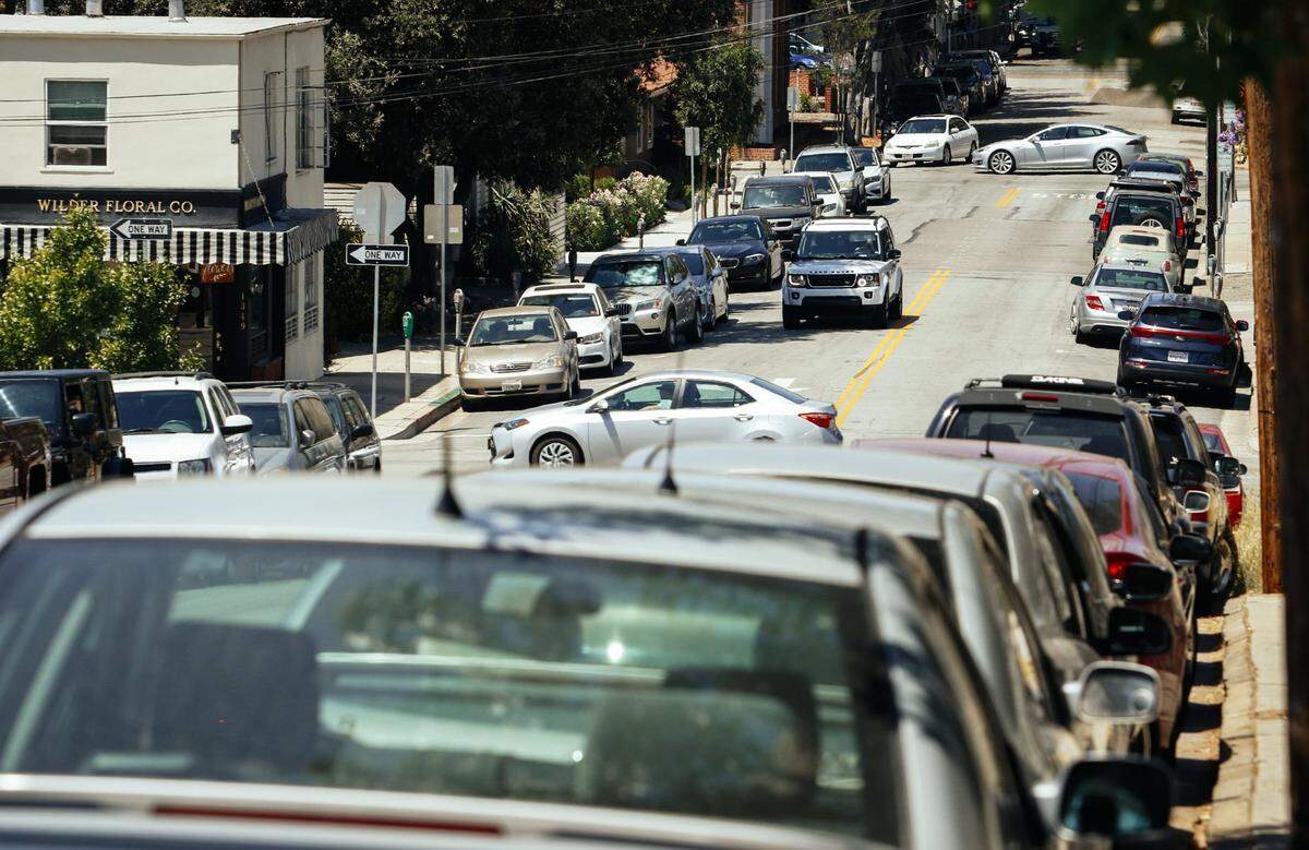 Parked cars line Chorro Street in downtown San Luis Obispo in this 2017 image. The city of San Luis Obispo’s parking rates increase starting in July.