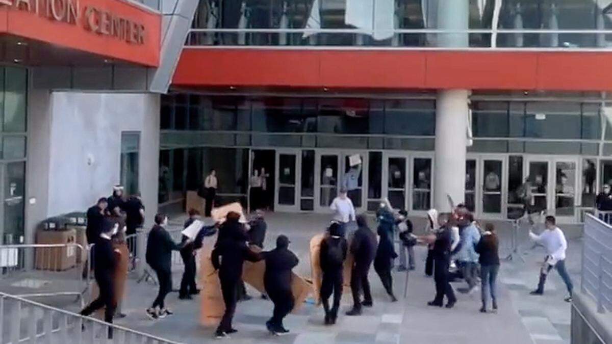 A still photo from a video shows the moment protesters and law enforcement clashed in front of the Cal Poly Rec Center on Jan. 23, 2024. A small group of people involved in a pro-Palestine protest reportedly attempted to breaking into the building where a winter career fair was being hosted.