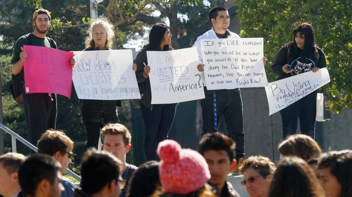 Cal Poly students protest at the University Union plaza in November 2015 in response to hate speech on a free speech wall erected on Dexter Lawn.