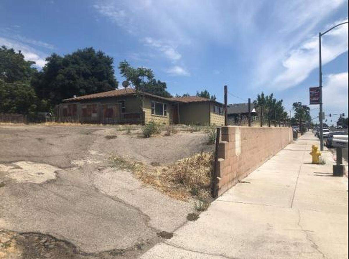 A vacant house and storage facility currently occupy the 7835 El Camino Real property that’s slated to become a Human Bean drive-thru coffee shop.