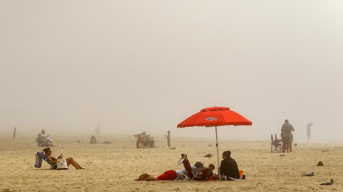 While inland temperatures were approaching triple digits in parts of the county, folks in Pismo Beach were soaked in a cool layer of fog throughout the day.