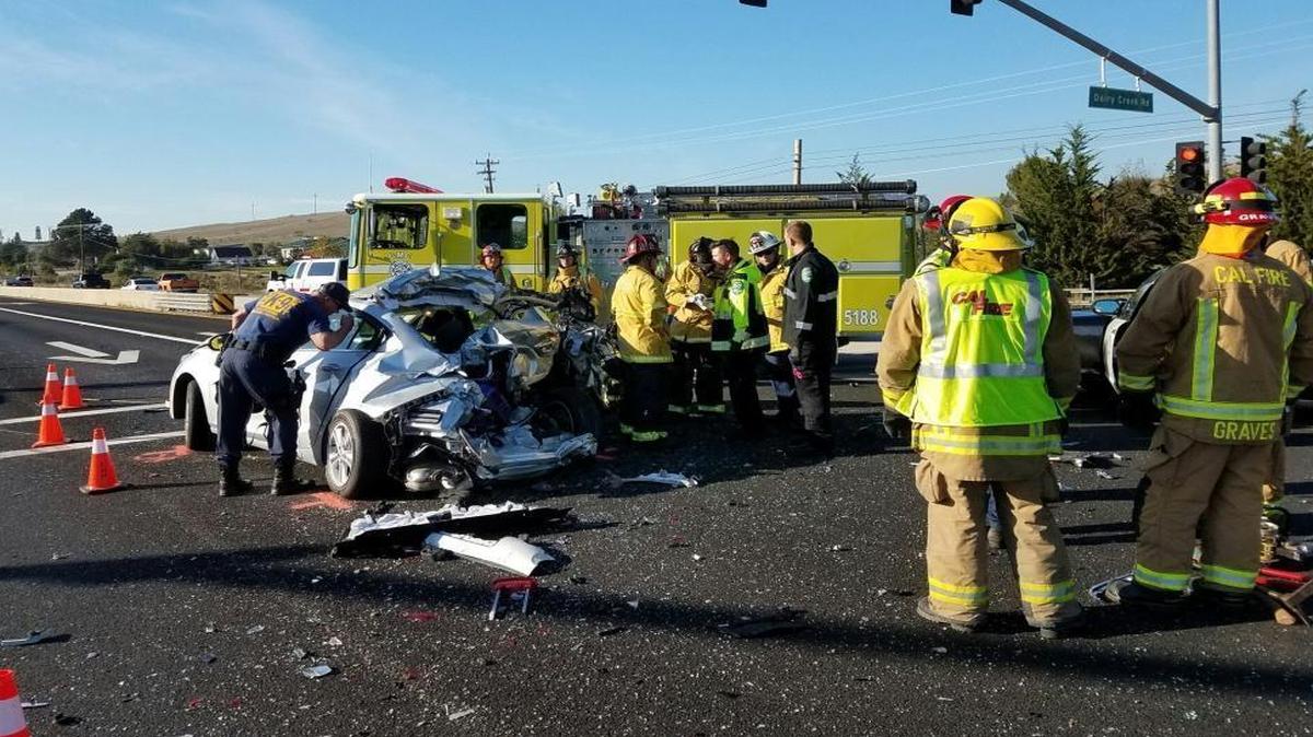 Cal Fire crews respond to the scene of a vehicle collision near Cuesta College that killed one person and injured three others.