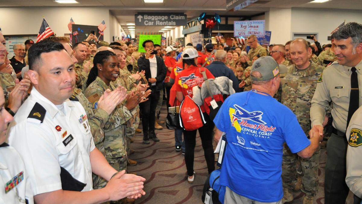 Hundreds of supporters, families and friends turned out at the Santa Maria Airport on Wednesday evening, April 26, 2023, to welcome veterans returning from an Honor Flight trip to Washington, D.C.