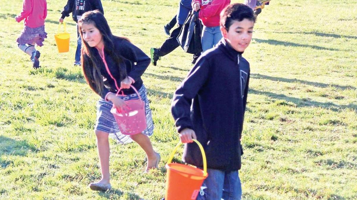 Local children search for hidden eggs and gifts at Shamel Park in Cambria early Easter morning at the annual community Easter Egg Hunt. Arroyo Grande will hold its 27th annual Family Egg Hunt and Festival on March 26 at Elm Street Park.