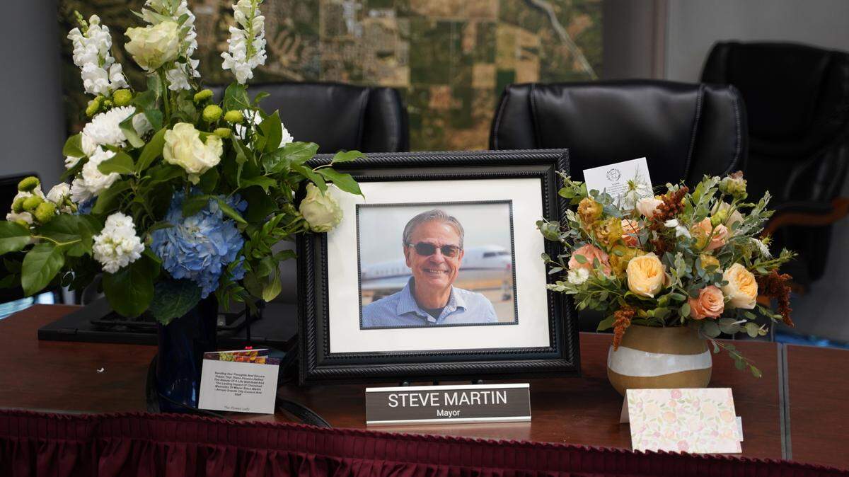A picture of Mayor Steve Martin and flowers sat at his spot on the dais at Tuesday’s Paso Robles City Council meeting, the day after his death due to cancer.