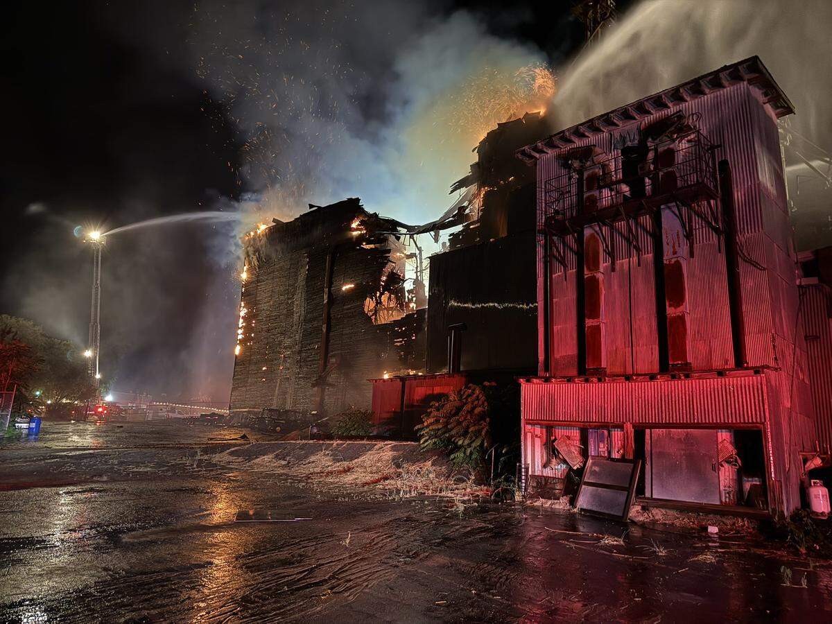 Flames quickly destroyed a large portion of the Templeton Feed & Grain building in Templeton on July 5, 2025. 